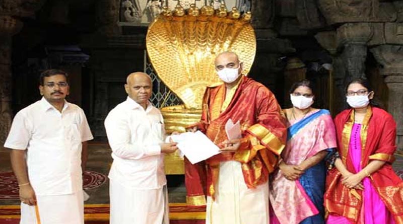 Ramakrishna Prasad hands over Rs 4.20 crore donation check announced by NRI Ravi Ika to Thirumala Srivari SVBC Trust